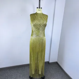 Detailed view of lime green sleeveless fringe bandage evening dress with shimmer threads