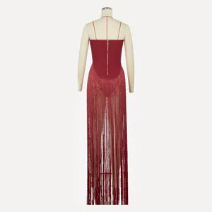 Back view detail of elegant red sequined bodysuit with long floor-length tassel fringe