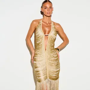 Elegant gold fringed halter evening dress with deep V-neckline for glamorous parties