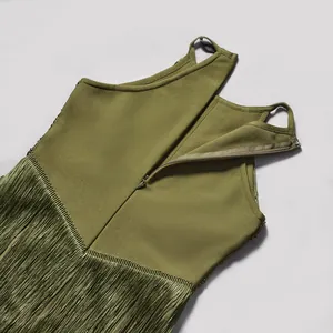 Detail view of olive green fringe bandage dress with back zipper and tassels