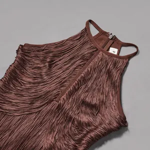 Close-up detail of a brown sleeveless fringe bandage dress ideal for elegant party wear