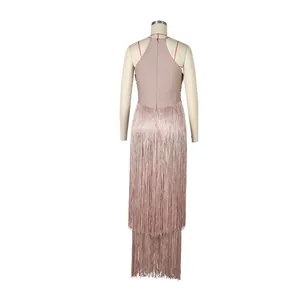 Back view of a mauve sleeveless dress featuring tiered fringe details and a halter neck.
