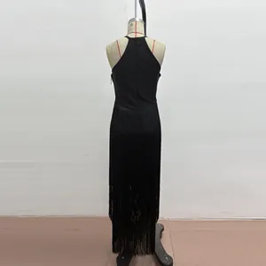 Back view of black sleeveless bandage dress with long fringe detailing for parties