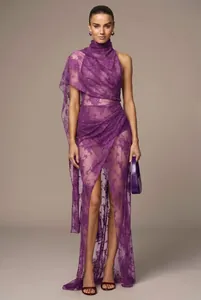 Stunning purple floral lace one-shoulder maxi dress featuring a draped cape and high leg slit