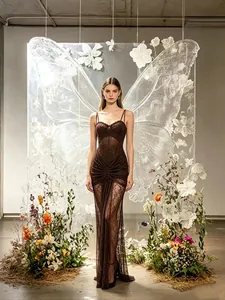 Elegant dark brown lace evening gown with cutout details and ruched waist for party wear