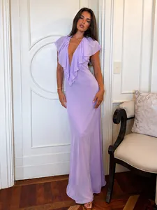 Detail of an elegant lavender deep V-neck maxi dress featuring cascading ruffles and a flowy fit