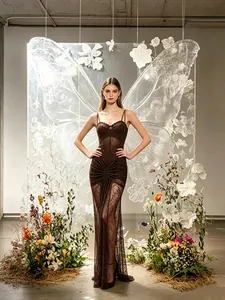 Elegant brown lace evening gown with sheer pleated details and butterfly backdrop decoration