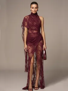 Elegant burgundy lace maxi dress with high slit and sheer details for resort wear.