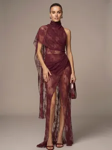 Detailed view of sheer wine red lace maxi dress with elegant draped neck and floral pattern