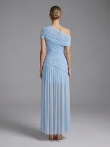 Back view of elegant light blue one-shoulder ruched mesh maxi dress for evening