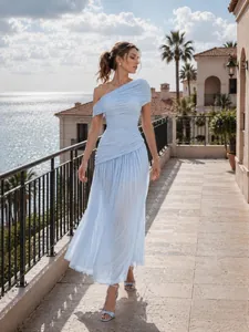 Elegant light blue one-shoulder mesh maxi dress with ruched details and waist cinching.