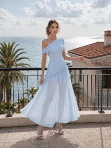 Detailed view of an elegant light blue one-shoulder pleated mesh long dress for women.