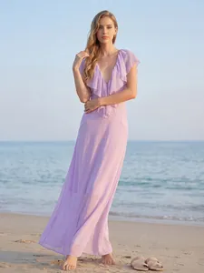 Elegant lavender maxi dress with ruffled V-neck for a stylish summer beach resort