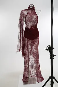 Detailed view of sexy wine red lace long dress featuring elegant floral sheer patterns