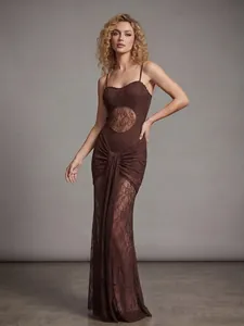 Elegant brown lace evening gown featuring cutout detail and spaghetti straps for gala.