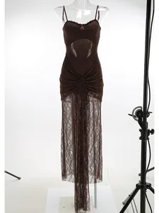 Elegant brown lace hollow-out slip dress with ruched bodycon design for formal party events.