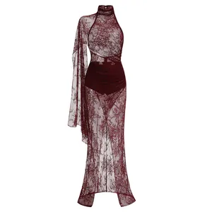 Detailed view of wine red lace halter maxi dress with asymmetric draped cape sleeve