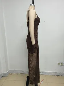 Detailed side profile of brown lace paneled ruched maxi slip dress on a mannequin