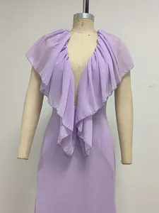 Close-up of elegant purple deep V-neck evening dress featuring ruffled collar detail