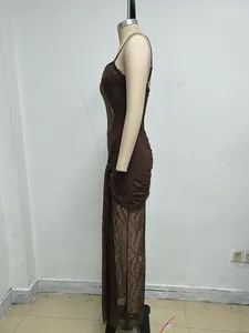 Side view detail of a brown lace patchwork ruched evening maxi dress on a dress form