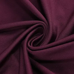 High-quality macro view of deep burgundy ribbed fabric texture for sexy pleated dress