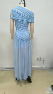Close-up of light blue one-shoulder mesh maxi dress with ruched pleated details