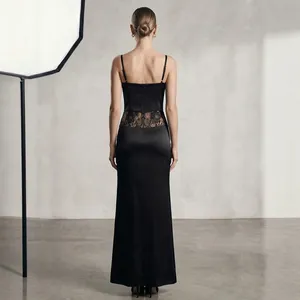 Elegant black slim fit slip dress with lace patchwork details and satin finish
