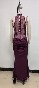 Back view of elegant purple lace patchwork evening gown with pleated detail and buttons
