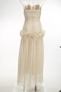 Elegant French style cream strapless maxi evening dress featuring exquisite ruffled waist detail