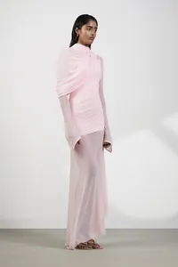 Detailed side view showing draped mesh texture and irregular hem of fairy pink French gown