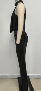 Side view of black halter lace patchwork dress with ruched details on mannequin.