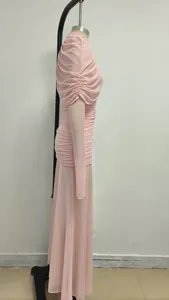 Side view detail of pink mesh ruched long dress featuring a French elegant style