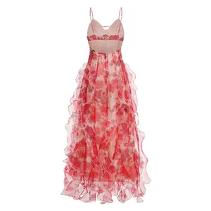 Detailed back view of a ruffled floral maxi dress featuring a low-cut design and thin straps