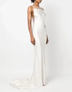 Elegant white satin backless evening gown with sheer mesh neckline and train