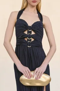 Navy blue pleated halter evening dress featuring unique gold ring details and cut-out front