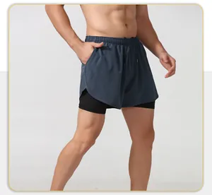 Detail view of men's double-layer quick-dry athletic shorts for running and fitness