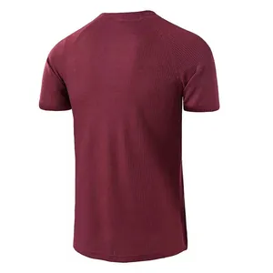 Detailed back view of men's maroon waffle knit short sleeve t-shirt with raglan sleeves