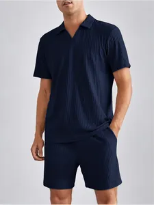 Completo due pezzi uomo blu navy plissettato con polo a maniche corte e pantaloncini