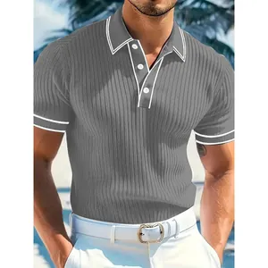 Detailed view of a grey ribbed men's short sleeve polo shirt with white contrast piping