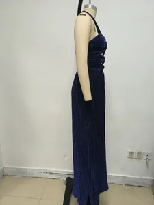 Detailed side view of navy blue pleated halter gown on mannequin against a plain background