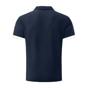 Detailed back view of a navy blue ice silk waffle knit polo shirt with white contrast cuffs