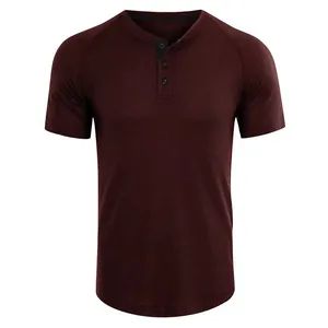 Detailed view of maroon men's short sleeve Henley shirt with waffle texture and buttons