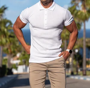 Detailed view of a white ribbed slim-fit polo shirt for men on an athletic model