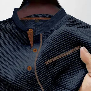 Detail of breathable ice silk fabric on men's blue Henry collar polo shirt