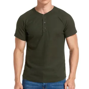 Detailed view of dark green waffle knit men's Henley shirt with three-button placket
