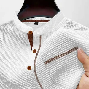 Close-up of white breathable waffle knit Henley shirt with stylish brown collar details