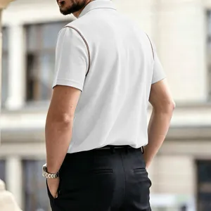 Back view of a breathable white textured polo shirt with contrast shoulder trim.