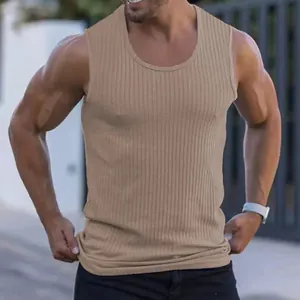 Close-up of men's khaki ribbed fitness tank top showing elastic slim fit texture