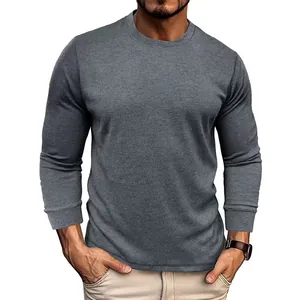 Close-up detail of the grey waffle knit texture on a men's crewneck long sleeve t-shirt