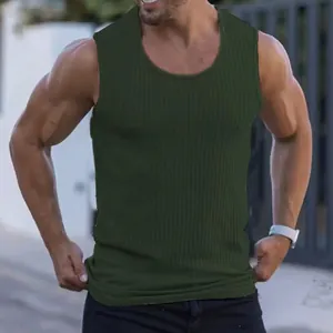 Detail view of the ribbed texture on a men's dark green slim fit athletic tank top.